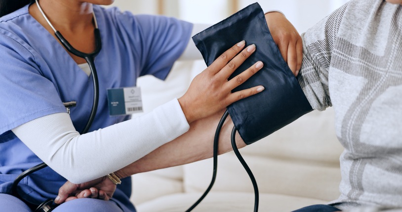 Nurse taking a patient’s blood pressure at Spring Lake Skilled Nursing and Rehabilitation