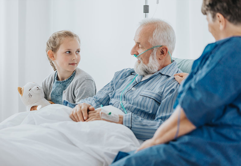 A little girl visits her grandfather in hospice care in Shreveport, LA