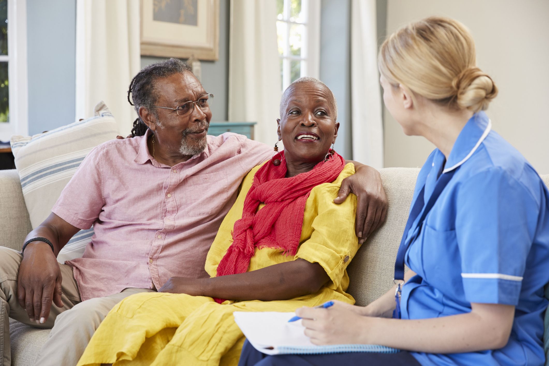 Skilled nursing care discussion with elderly couple in Spring Lake, LA home setting