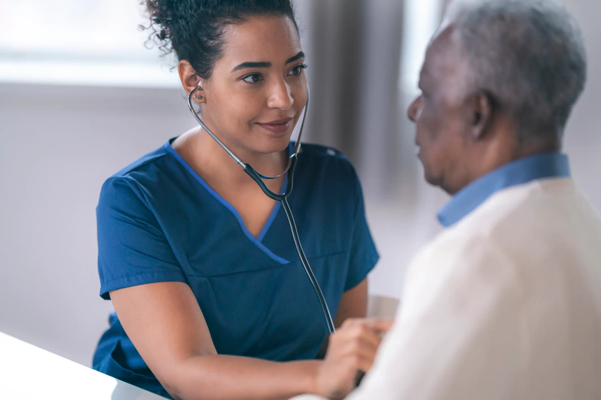 Spring Lake nurse checking heart rate of elderly patient