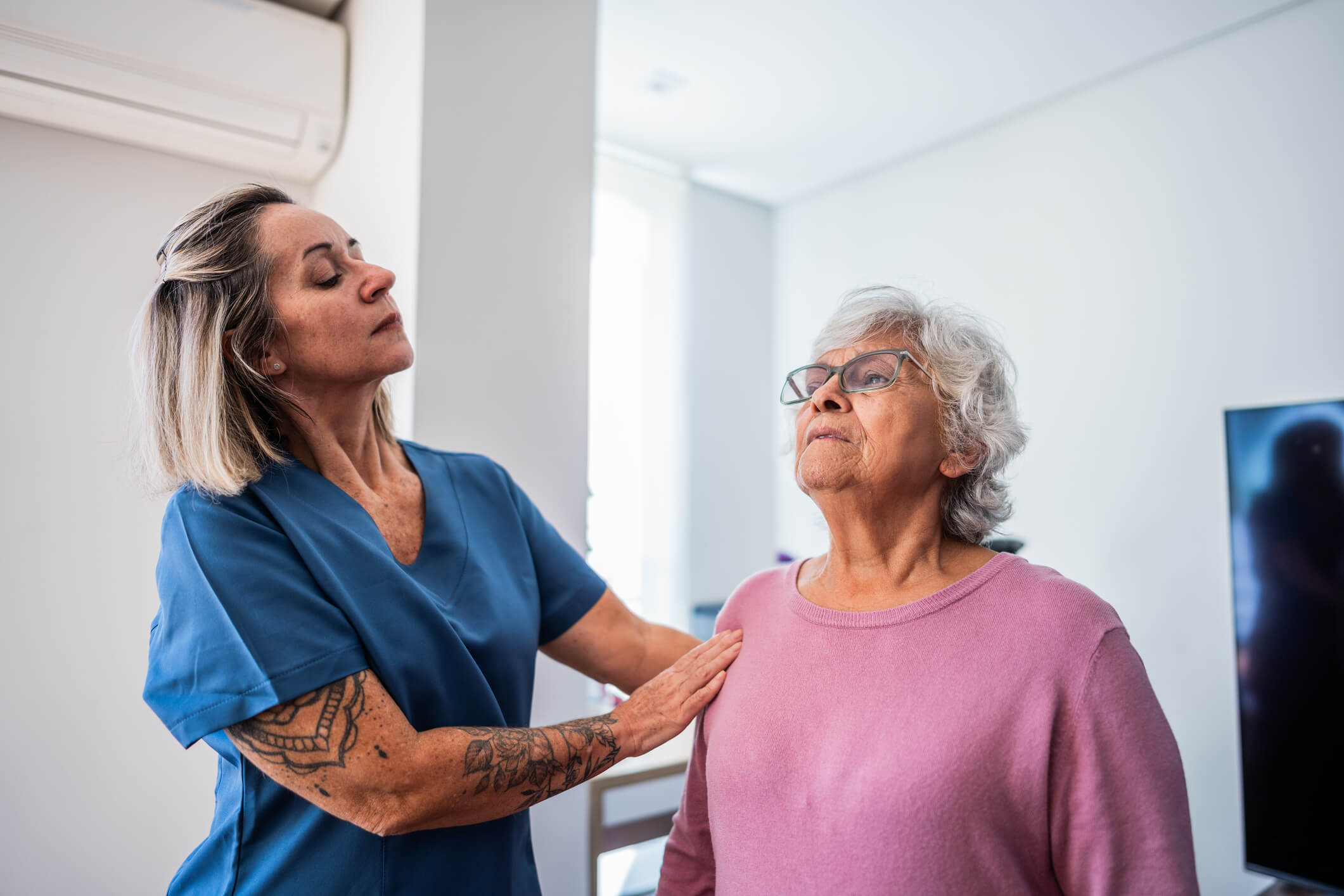 A nurse assists an elderly woman during cardiac and respiratory rehabilitation in Shreveport, LA
