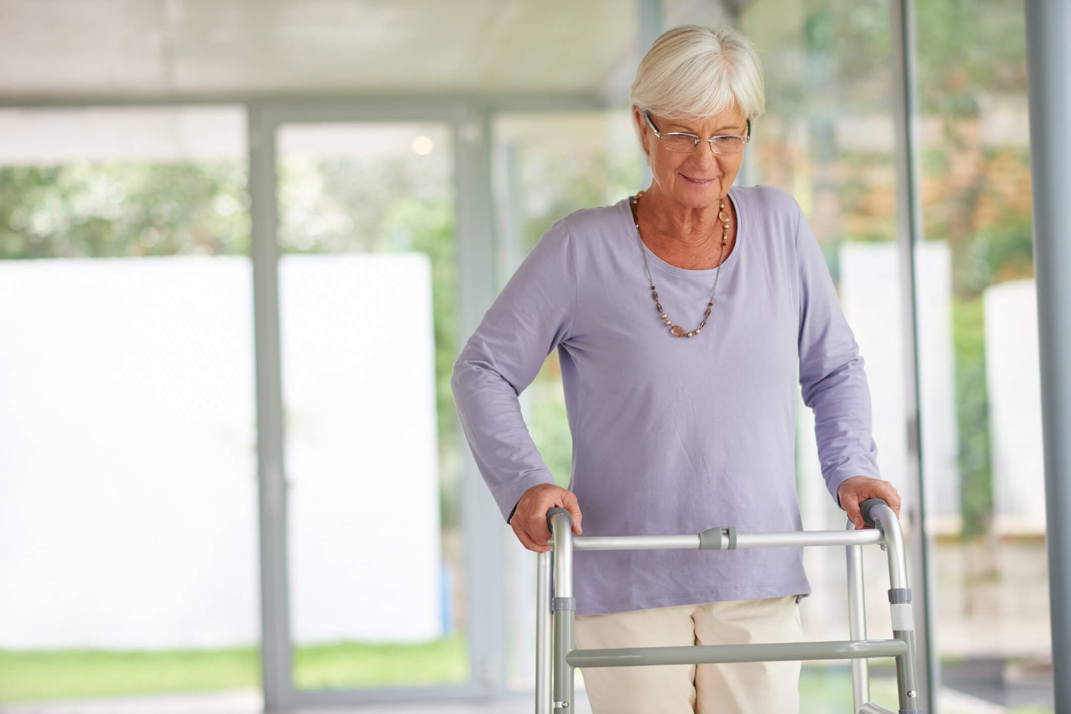 Elderly woman using a walker during Short-Term Post-Surgery Rehab in Shreveport, LA