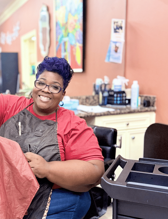 Staff member working in the on-site salon